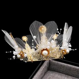 Elegant gold flower crown cake topper with pearls and mesh for wedding party decor