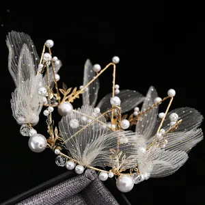Exquisite gold wire crown with white pearls and mesh wings for birthday cake or hair decor