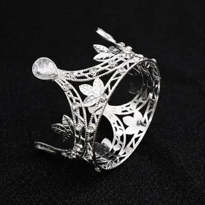 Silver crown cake topper with sparkling rhinestones and floral leaf design for parties