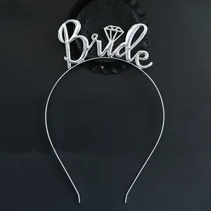 Detail of silver Bride headband featuring openwork lettering and diamond icon on black base