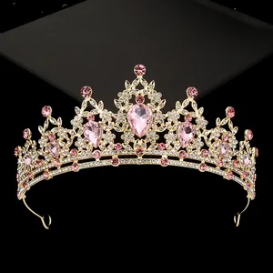 Elegant gold bridal crown with pink crystals and rhinestones for pageant and wedding