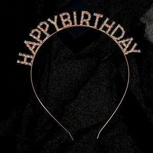 Serre-tête Happy Birthday en or rose avec cristaux blancs sur fond en résille noire