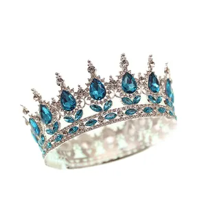 Diadème de mariée baroque argenté avec cristaux bleus en goutte et strass étincelants