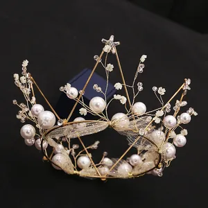 Golden mesh bridal crown with white pearls and sparkling star topper for cake decor