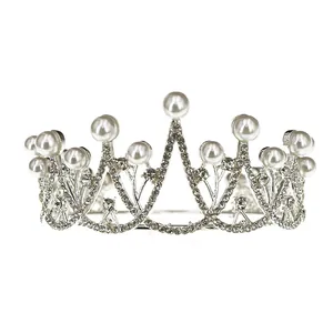 Elegant silver bridal crown with white pearls and sparkling rhinestones for weddings