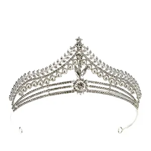 Elegant silver bridal tiara with white pearls and sparkling rhinestones for weddings