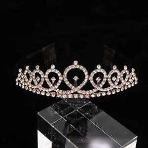 Close-up of rose gold crystal birthday crown with intricate rhinestone detailing and sparkles
