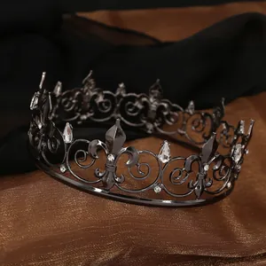 Luxury gothic black crown with crystal fleur-de-lis patterns for bridal wedding photography
