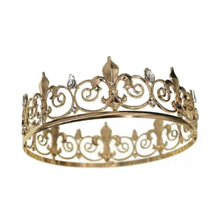 Luxury gold bridal crown with vintage Fleur-de-lis patterns and shimmering rhinestones