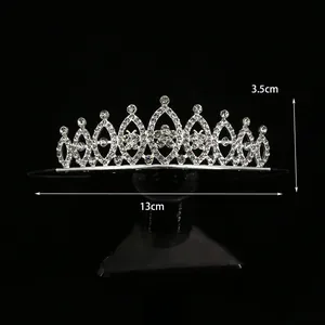 Close-up of a silver bridal crown hair comb with clear rhinestones, 13cm wide and 3.5cm high