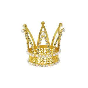 Elegant gold mini crown cake topper with pearls and rhinestones for party decoration
