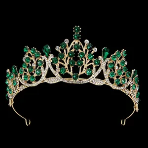 Vintage gold baroque bridal tiara with emerald green crystals and intricate leaf design