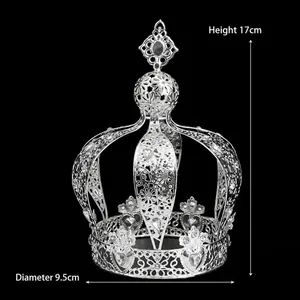 Elegant silver metal hollow crown ornament with floral heart patterns for cake decor