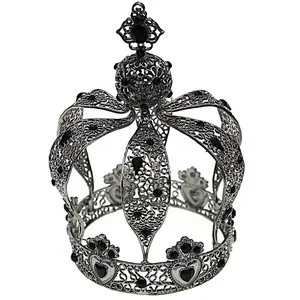 Gothic silver metal tiara with black heart and teardrop gemstones on white background