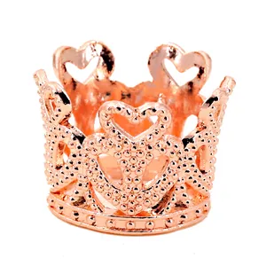 Elegant rose gold mini crown cake topper and hair accessory with heart hollow design