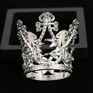 Elegant silver alloy mini crown cake topper featuring hollow leaves and sparkling rhinestones