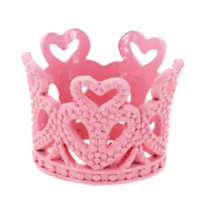 Detail showing high-quality pink metal crown with镂空 heart patterns and pearl textures