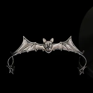 Detailed view of a silver alloy vampire bat wing headband for Halloween party accessories