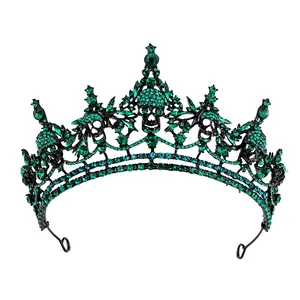 Gothic black crown with emerald green rhinestones and skull design for Halloween queen