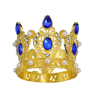 Elegant gold alloy mini crown featuring blue teardrop rhinestones and white pearls