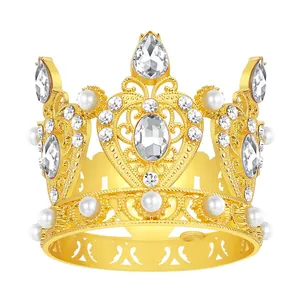 Elegant gold crown with crystal heart and pearls for cake decoration and parties