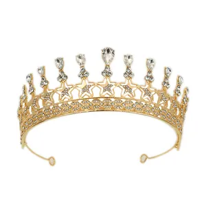 Detailed view of golden bridal tiara featuring rhinestone stars and teardrop gemstones