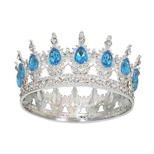 Close-up of blue teardrop crystals and vintage silver filigree on bridal crown