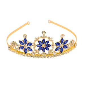 Detailed view of snowflake crown featuring blue crystals and gold alloy headband