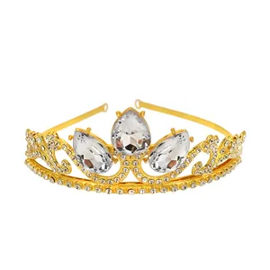Detailed view of girls gold rhinestone crown headband with drop shaped crystals