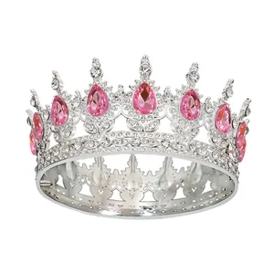 Vintage bridal crown with pink teardrop crystals and sparkling rhinestones on silver metal