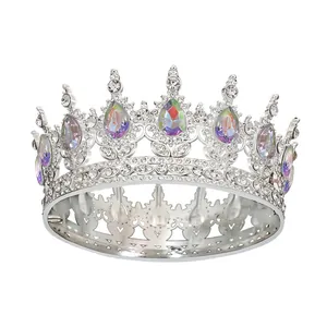 Detailed view of silver crown featuring colorful teardrop crystals and sparkling rhinestones