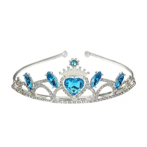Detail of silver alloy tiara featuring light blue heart-shaped gems and marquise stones