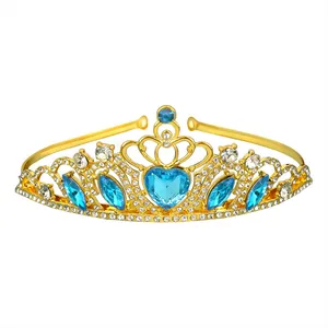 Golden bridal crown with large blue heart crystal and sparkling rhinestones