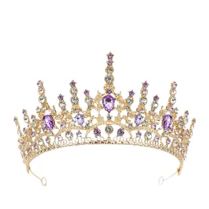 Golden Baroque bridal crown with teardrop purple crystals and white rhinestones decoration