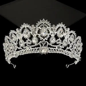 Elegant silver bridal crown with sparkling rhinestones and central pear-cut crystal decoration