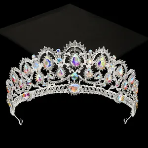 Detailed close-up of luxury bridal crown with AB crystals and intricate silver alloy design