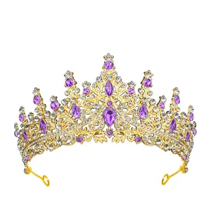 Luxurious gold bridal tiara with sparkling purple crystals and intricate rhinestone details