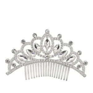 Detail of silver alloy crown hair comb with sparkling crystals and rhinestones