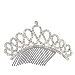 Detailed close-up of a silver crystal tiara comb with sparkling rhinestones for girls
