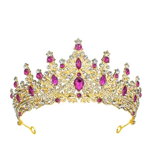 Luxurious gold Baroque crown with pink teardrop gemstones and sparkling crystals