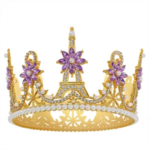 Detail of golden bridal crown with purple crystals, pearls and Eiffel Tower motif