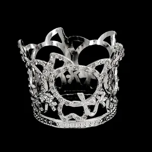 Elegant silver bridal crown with butterfly patterns and sparkling rhinestones on black background
