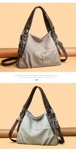 Detail view of taupe lychee grain PU leather tote bag with brown straps and hardware