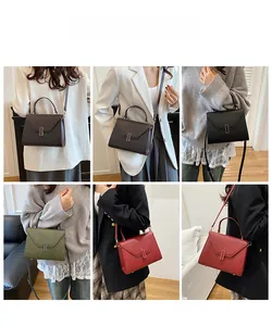 Detail shots of trapezoid leather handbag featuring a metal lock and detachable strap