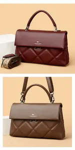 Macro detail of wine red and brown quilted leather bags with gold hardware and logo