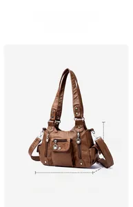 Detail view of brown vintage soft PU leather handbag with dimensions and silver zippers
