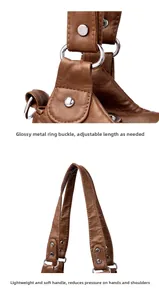 Detailed view of brown washed PU leather handbag with adjustable silver metal hardware