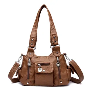 Brown vintage washed PU leather handbag with multi-pocket design and silver pendants
