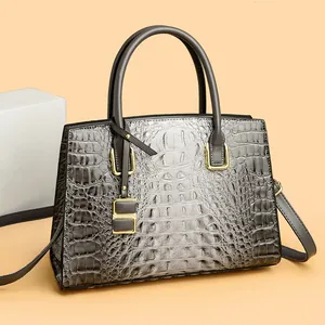 Fashionable grey gradient crocodile pattern handbag with top handles and gold hardware