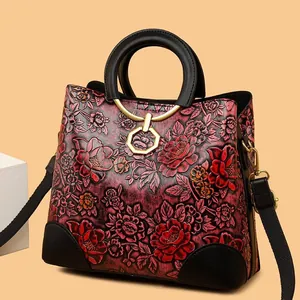 Vintage embossed floral leather handbag with gradient red and black peony patterns